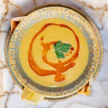 Red lentil soup with paprika oil